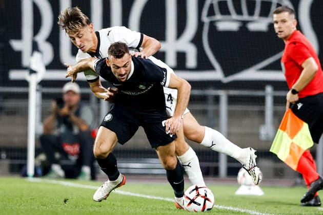 SOCCER - UEFA EL, Sturm vs Rennais GRAZ,AUSTRIA,16.SEP.26 - SOCCER - UEFA Europa League, Sturm Graz vs Stade Rennais FC. Image shows Anthony Rouault (Rennais) and Juergen Heil (Sturm).  GEPAxpictures xJamesxDoak