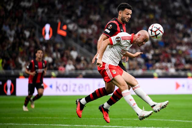 AC MIlan v SL Benfica - UEFA Europa League Fredrik Aursnes of SL Benfica competes for. aheader with Goncalo Ramos of AC Milan during the UEFA Europa League 2026 27 league phase football match between AC Milan and SL Benfica. Milan Italy Copyright: xNicolòxCampox
