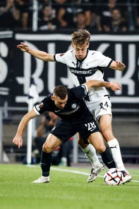 SOCCER - UEFA EL, Sturm vs Rennais GRAZ,AUSTRIA,16.SEP.26 - SOCCER - UEFA Europa League, Sturm Graz vs Stade Rennais FC. Image shows Anthony Rouault (Rennais) and Juergen Heil (Sturm).  GEPAxpictures xJamesxDoak
