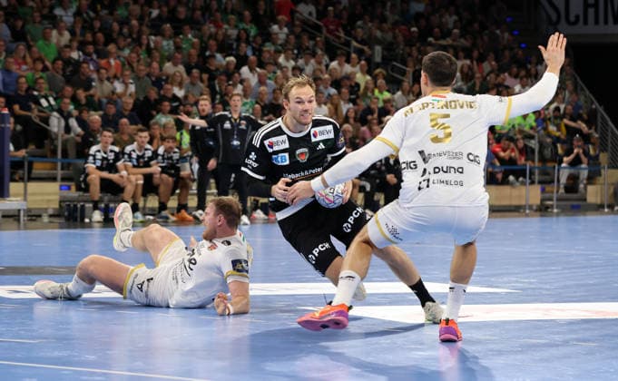 Mathias Gidsel with the ball, Ivan Martinovic in a duel; game scene, action, sports, handball, Champions League, Men s Champions League, Matchday 2, 2026–2027 season, September 16, 2026: Füchse Berlin vs. One Veszprém HC at the Max Schmeling Halle