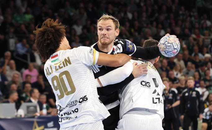 Ali Ismail Zeinelabedin, Mathias Gidsel with the ball, Ivan Martinovic, tackle, game action, sports, handball, Champions League, Men s Champions League, Matchday 2, 2026–2027 season, September 16, 2026, Füchse Berlin vs. One Veszprém HC at the Max Schmeling Halle