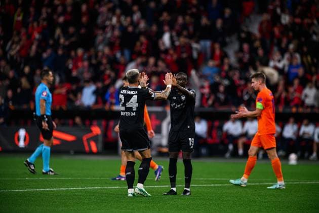 LEVERKUSEN, GERMANY - 16 SEPTEMBER, 2026: Aleix Garcia of Bayer 04 Leverkusen, Germany, Moussa Diaby of Bayer 04 Leverkusen - The UEFA Europa League match Bayer 04 Leverkusen vs. NK Celje at BayArena.  Copyright: xVitaliixKliuievx