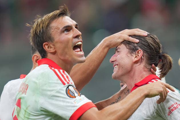 Benfica s Jakub Kaminski celebrates after scoring 0-2 during the Europa League soccer match between Ac Milan and Benfica at San Siro Stadium in Milan , Italy - September 16 , 2026. - Soccer  Copyright: xSpada LaPressex