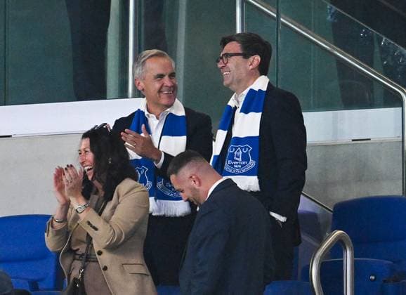 Canadian Prime Minister Mark Carney and British Prime Minister Andy Burnham celebrate the opening goal Everton v Wolverhampton Wanderers, EFL Carabao Cup, Football, Hill Dickinson Stadium, Liverpool, UK - 16 Sep 2026Liverpool Hill Dickinson Stadium United Kingdom EDITORIAL USE ONLY No use with unauthorised audio, video, data, fixture lists, club league logos or live services. Online in-match use limited to 120 images, no video emulation. No use in betting, games or single club league player publications.  Copyright: xAnnaxGowthorpe Shutterstockx 17154425aj