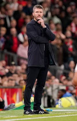 Manchester, England, 16th September 2026. Michael Carrick head coach of Manchester United, ManU looks on as they loose a two goal lead during the Manchester United vs Brighton and Hove Albion Carabao Cup match at Old Trafford, Manchester. Picture credit should read: Andrew Yates Sportimage EDITORIAL USE ONLY. No use with unauthorised audio, video, data, fixture lists, club league logos or live services. Online in-match use limited to 120 images, no video emulation. No use in betting, games or single club league player publications. SPI_053_AY_MAN_UTD_BRIGHTON SPI-5001-0053