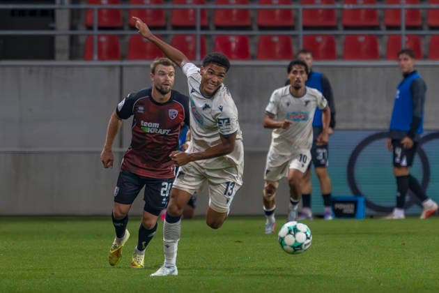 Ingolstadt, Germany, August 8, 2026, 3rd League 2026–2027, Matchday 6: FC Ingolstadt 04 vs. TSG Hoffenheim II. Pictured from left, in a tackle: Yannick Deichmann (FCI) and Tristan Spranger (TSG II). DFB and DFL regulations prohibit any use of photographs as image sequences and or quasi-video. Audi Sportpark Bayern Copyright: xFotostandx xSchäferx
