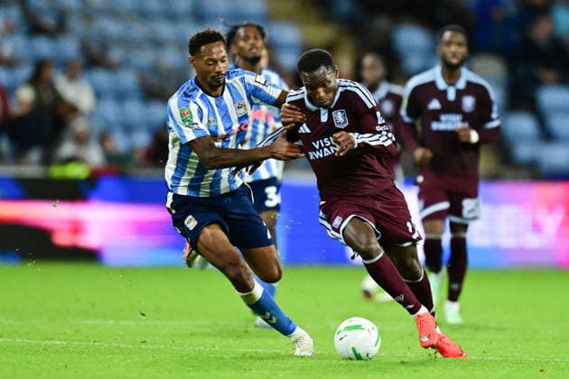 Coventry City v Aston Villa, EFL Cup Coventry City defender Ethan Pinnock (2) battles for possession with Aston Villa forward Nicolas Jackson (11) during the EFL Cup match between Coventry City and Aston Villa at the Coventry Building Society Arena, Coventry, UK on 16 September 2026. Coventry Coventry Building Society Arena West Midlands UK Editorial use only DataCo restrictions apply See www.football-dataco.com , Copyright: xDennisxGoodwinx PSI-24892-0055