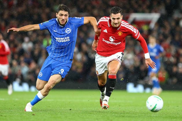 MANCHESTER, ENGLAND, SEPTEMBER 16: Jaouen Hadjam of Brighton & Hove Albion (L) vies with Diogo Dalot of Manchester United, ManU (R) on the ball during a Carabao Cup Third Round match between Manchester United and Brighton & Hove Albion at the Old Trafford on September 16, 2026 in York, England. (Photo by Zach Forster Sports Press Photo) Copyright: xZachxForster SportsxPressxPhotox Sportspressphoto_SPR233145