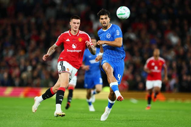 MANCHESTER, ENGLAND - SEPTEMBER 16: Pascal Struijk of Brighton & Hove Albion clears from Benjamin äeöko of Manchester United, ManU during the Carabao Cup Third Round match between Manchester United and Brighton & Hove Albion at Old Trafford on September 16, 2026 in Manchester, England.  Copyright: xMBxMediax