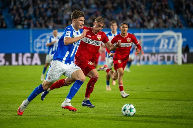 Rostock, Germany, September 16, 2026, 3. Liga 2026–2027, Matchday 6: FC Hansa Rostock vs. VfB Stuttgart II. Pictured from left, in a tackle: Peter Kiedl (Hansa Rostock) and Veit Stange (VfB Stuttgart II). DFB and DFL regulations prohibit any use of photographs as image sequences and or quasi-video Copyright: xFotostandx xVoelkerx