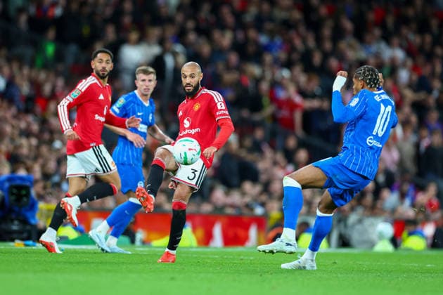 16th September 2026; Old Trafford, Manchester, England; Carabao Cup Football, Manchester United, ManU versus Brighton and Hove Albion; Noussair Mazraoui of Manchester United plays the ball back RogerxEvans