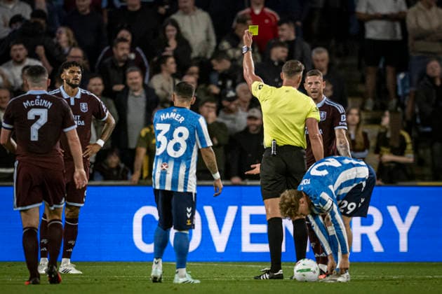 16th September 2026; Coventry Building Society Arena, Coventry, West Midlands, England; Carabao Cup Football, Coventry City versus Aston Villa; Referee Robert Jones issues a yellow card to Ross Barkley of Aston Villa GodfreyxPitt