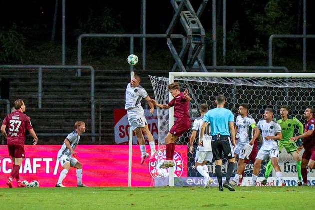 September 16, 2026, xsefx, Soccer, SC Fortuna Köln vs. SV Wehen Wiesbaden, 3rd Division, South Division, Matchday 6, 2026–2027 Season: Marcus Müller of SV Wehen Wiesbaden, No. 21, in a header duel against Kevin Krumme of Fortuna Cologne, No. 02. DFB regulations prohibit any use of photographs as image sequences and or quasi-video. North Rhine-Westphalia, Germany