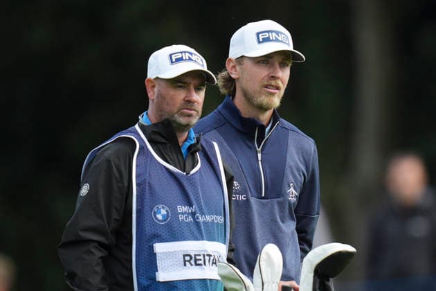 VIRGINIA WATER, ENGLAND - SEPTEMBER 17: Kristoffer Reitan (NOR) and his caddie discuss yardage on the 18th hole during Round 1 at the BMW PGA, Golf Herren Championship at Wentworth Golf Club, Virginia Water on September 17, 2026 in Surrey, England The BMW PGA Championship