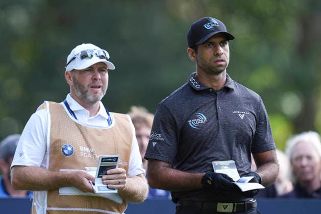 VIRGINIA WATER, ENGLAND - SEPTEMBER 17: Aaron Rai (ENG) and his caddie Jason Timmis discuss yardage during Round 1 at the BMW PGA, Golf Herren Championship at Wentworth Golf Club, Virginia Water on September 17, 2026 in Surrey, England The BMW PGA Championship