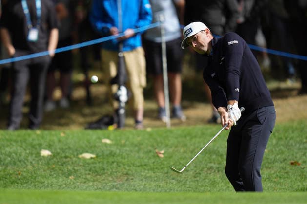 VIRGINIA WATER, ENGLAND - SEPTEMBER 17: Joel Girrbach (SUI) chips to the 1st green during Round 1 at the BMW PGA, Golf Herren Championship at Wentworth Golf Club, Virginia Water on September 17, 2026 in Surrey, England The BMW PGA Championship