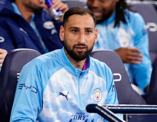 Manchester, England, 17th September 2026. Gianluigi Donnarumma of Manchester City takes a seat on the bench during the Manchester City vs Norwich City Carabao Cup match at the Etihad Stadium, Manchester. Picture credit should read: Andrew Yates Sportimage EDITORIAL USE ONLY. No use with unauthorised audio, video, data, fixture lists, club league logos or live services. Online in-match use limited to 120 images, no video emulation. No use in betting, games or single club league player publications. SPI_011_AY_Man_City_Norwich SPI-5003-0011