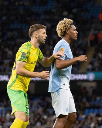 Manchester City v Norwich City Carabao Cup Sam Field of Norwich City with Floyd Samba of Manchester City during the Carabao Cup Third Round match between Manchester City and Norwich City at the Etihad Stadium, Manchester. 17 09 2026 Commissioned for use in Newsquest Norfolk titles only. All other titles fees apply. UK Newspapers OUT Copyright: xMattxWilkinsonx FIL-23950-0064
