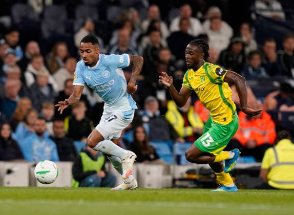 Manchester, England, 17th September 2026. Allan Elias of Manchester City gets past Darlin Yongwa of Norwich City during the Manchester City vs Norwich City Carabao Cup match at the Etihad Stadium, Manchester. Picture credit should read: Andrew Yates Sportimage EDITORIAL USE ONLY. No use with unauthorised audio, video, data, fixture lists, club league logos or live services. Online in-match use limited to 120 images, no video emulation. No use in betting, games or single club league player publications. SPI_014_AY_Man_City_Norwich SPI-5003-0014