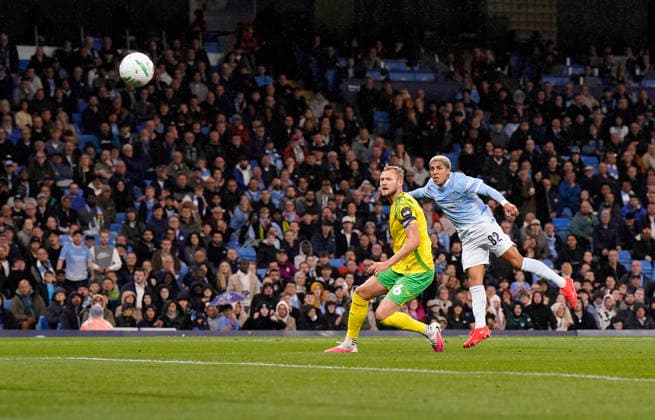 Manchester, England, 17th September 2026. Rico Lewis of Manchester City has a shot which goes wide during the Manchester City vs Norwich City Carabao Cup match at the Etihad Stadium, Manchester. Picture credit should read: Andrew Yates Sportimage EDITORIAL USE ONLY. No use with unauthorised audio, video, data, fixture lists, club league logos or live services. Online in-match use limited to 120 images, no video emulation. No use in betting, games or single club league player publications. SPI_015_AY_Man_City_Norwich SPI-5003-0015