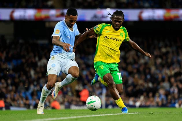 Manchester City v Norwich City, EFL Cup Daniel Grimshaw (32) of Norwich City and Allan (37) of Manchester City challenge for the ball during the EFL Cup match between Manchester City and Norwich City at the Etihad Stadium, Manchester, UK on 17 September 2026. Manchester Etihad Stadium Manchester UK Editorial use only DataCo restrictions apply See www.football-dataco.com , Copyright: xConorxMolloyx PSI-24893-0023