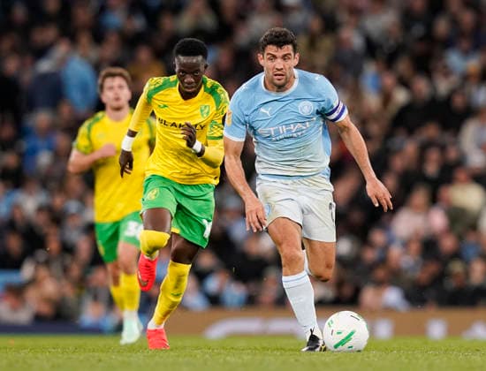 Manchester, England, 17th September 2026. Mateo Kovacic of Manchester City in action with Papa Amadou Diallo of Norwich City during the Manchester City vs Norwich City Carabao Cup match at the Etihad Stadium, Manchester. Picture credit should read: Andrew Yates Sportimage EDITORIAL USE ONLY. No use with unauthorised audio, video, data, fixture lists, club league logos or live services. Online in-match use limited to 120 images, no video emulation. No use in betting, games or single club league player publications. SPI_022_AY_Man_City_Norwich SPI-5003-0022