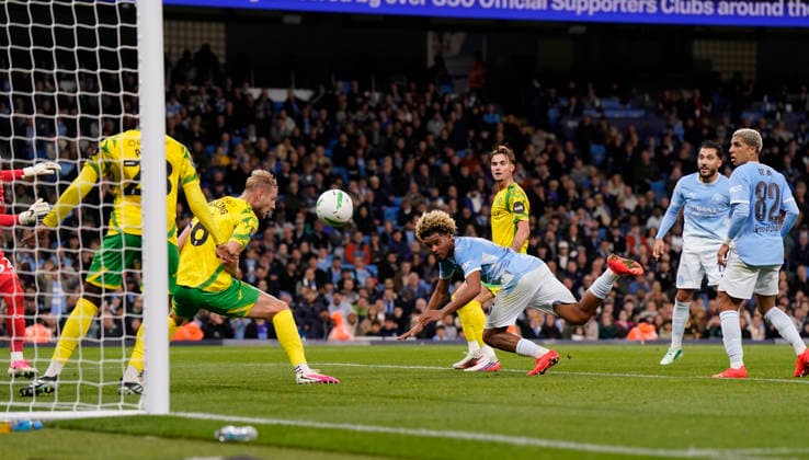 Manchester, England, 17th September 2026. Floyd Samba of Manchester City heads the first goal on his debut during the Manchester City vs Norwich City Carabao Cup match at the Etihad Stadium, Manchester. Picture credit should read: Andrew Yates Sportimage EDITORIAL USE ONLY. No use with unauthorised audio, video, data, fixture lists, club league logos or live services. Online in-match use limited to 120 images, no video emulation. No use in betting, games or single club league player publications. SPI_023_AY_Man_City_Norwich SPI-5003-0023