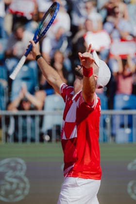 TENNIS - Davis Cup, AUT vs BEL VIENNA,AUSTRIA,18.SEP.26 - TENNIS - ITF Davis Cup, qualification round 2, Austria vs Belgium. Image shows the rejoicing of Jurij Rodionov (AUT).  GEPAxpictures xAlexanderxSolc