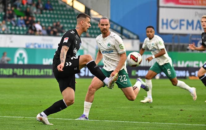 September 18, 2026 Soccer Season 2026–2027, Matchday 2, Bundesliga, SpVgg Greuther Fürth vs. Kleeblatt FC Magdeburg, FCM, Sports Photo by Zink, MeZi, xmexzix. DFL regulations prohibit any use of photographs as image sequences and or quasi-video; for editorial use only. Mateusz Zukowski, 22, FC Magdeburg; Jannis Heuer, 22, SpVgg Greuther Fürth, right