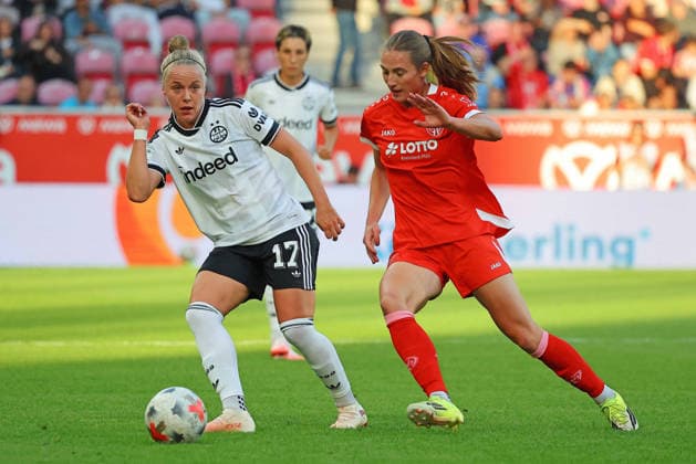 Mainz, Germany, September 18, 2026, Women’s Bundesliga 2026–2027, Matchday 5: 1. FSV Mainz 05 vs. Eintracht Frankfurt. Pictured, from left, in a tackle: Pia Sophie Wolter (Frankfurt) vs. Mattson Strickler (FSV). DFL and DFB regulations prohibit any use of photographs as image sequences and or quasi-video; Bruchwegstadion, Rhineland-Palatinate Copyright: xFotostandx xRacochax