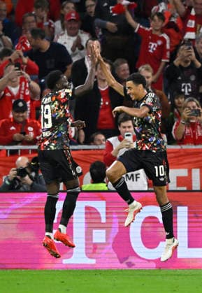 GOAL: 1–0 Jamal Musiala, FC Bayern Munich (FCB) 10 Goal celebration by Alphonso Davies, Bayern Munich (FCB) 19 FC Bayern Munich (FCB) vs. 1. FC Union Berlin (FCU) September 18, 2026 DFL regulations prohibit any use of PHOTOGRAPHS AS IMAGE SEQUENCES AND OR QUASI-VIDEO FC Bayern Munich FCB vs. 1 FC Union Berlin FCU