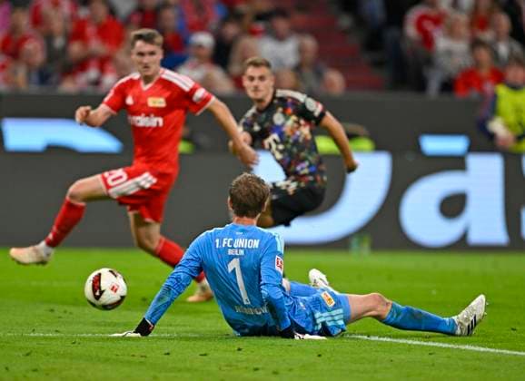 September 18, 2026, 2026–2027 Bundesliga season, Matchday 4, FC Bayern Munich vs. 1. FC Union Berlin, at the Allianz Arena in Munich, Union Berlin goalkeeper Frederik Rönnow on the ground