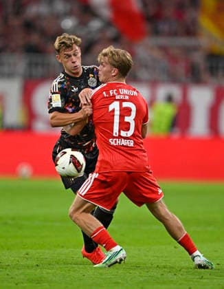 September 18, 2026, 2026–2027 Bundesliga, Matchday 4, FC Bayern Munich vs. 1. FC Union Berlin, at the Allianz Arena in Munich, from left: Joshua Kimmich (FC Bayern Munich) vs. Andreas Schäfer (Union Berlin)