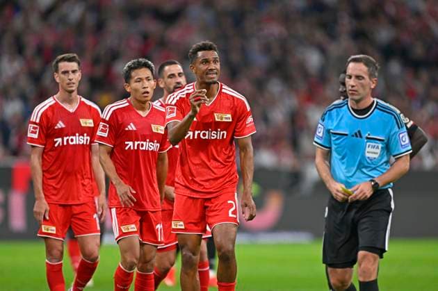 September 18, 2026, 2026–2027 Bundesliga, Matchday 4, FC Bayern Munich vs. 1. FC Union Berlin, at the Allianz Arena in Munich, Felix Uduokhai of Union Berlin receives a yellow card