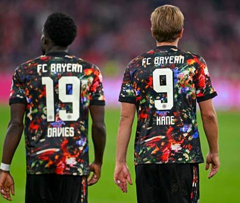 September 18, 2026, 2026–2027 Bundesliga Season, Matchday 4, FC Bayern Munich vs. 1. FC Union Berlin, at the Allianz Arena in Munich; from left: Alphonso Davies (FC Bayern Munich) and Harry Kane (FC Bayern Munich) in their Oktoberfest jerseys