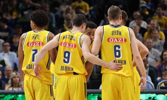 Jack Kayil, Jonas Mattisseck, Norris Agbakoko, Malte Delow, players discussing a play; Upper body action; Sports; Basketball; BBL; Bundesliga; Men s Division 1; Matchday; 2026–2027 season; September 18, 2026; ALBA Berlin vs. Niners Chemnitz 99ers