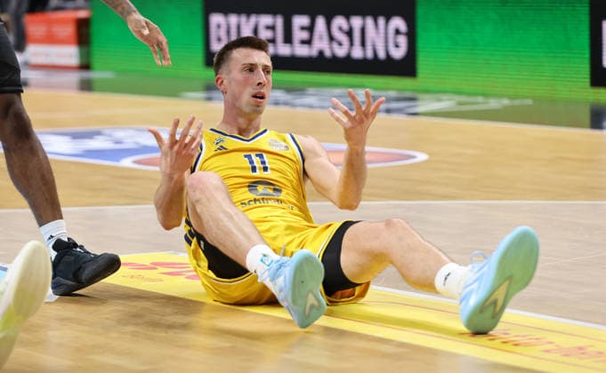 Joe Wieskamp on the floor after a tackle; Game scene; Action; Sports; Basketball; BBL; Bundesliga; Men s 1; Matchday; 2026–2027 season; September 18, 2026; ALBA Berlin vs. Niners Chemnitz 99ers