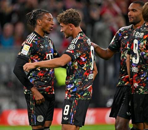 September 18, 2026, 2026–2027 Bundesliga, Matchday 4, FC Bayern Munich vs. 1. FC Union Berlin, at the Allianz Arena in Munich, from left: Michael Olise (FC Bayern Munich), Tom Bischof (FC Bayern Munich), Jonathan Tah (FC Bayern Munich) and Harry Kane (FC Bayern Munich) celebrate