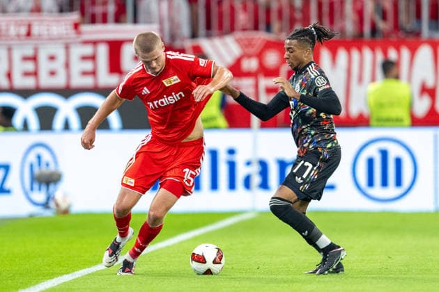 Tom Rothe 15 1 FC Union Berlin, Michael Olise 17 FC Bayern Munich, FC Bayern Munich 1 FC Union Berlin, Bundesliga, Matchday 4, September 18, 2026. DFB regulations prohibit any use of photographs as image sequences and or quasi-video. Munich, Bayern, Germany Copyright: xkolbert-press UlrichxGamelx