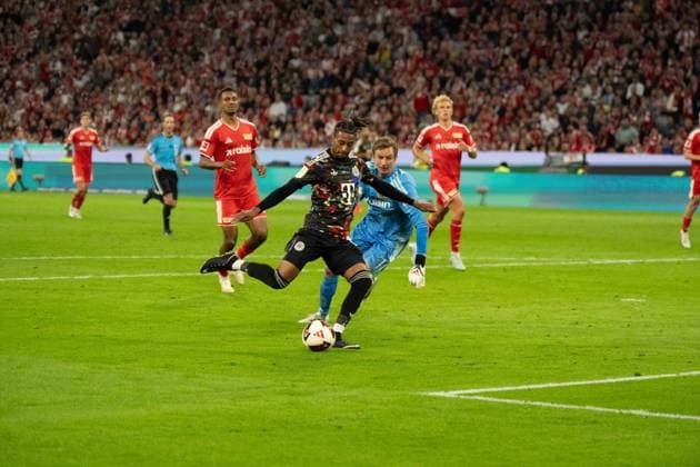 September 18, 2026: Soccer – FC Bayern Munich vs. Union Berlin, Matchday 4 of the Bundesliga at the Allianz Arena in Munich. Shot on goal by Michael Olise (FC Bayern Munich), 17–6 IMPORTANT NOTICE: In accordance with DFL and DFB regulations, it is prohibited to use or allow the use of photographs taken in the stadium and or during the game in the form of sequential images and or video-like photo sequences. Copyright: xJamesxZabelx