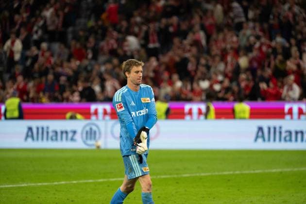 September 18, 2026: FC Bayern Munich vs. Union Berlin, Matchday 4 of the Bundesliga at the Allianz Arena in Munich; Frederik Rönnow, Union Berlin, 1 minute after the final whistle IMPORTANT NOTICE In accordance with DFL and DFB regulations, it is prohibited to use or allow the use of photographs taken in the stadium and or during the match in the form of sequential images and or video-like photo series. Copyright: xJamesxZabelx