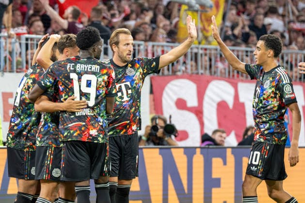 Alphonso Davies 19 (FC Bayern Munich) celebrates a goal; Harry Kane 9 (FC Bayern Munich) high-fives Jamal Musiala 10 (FC Bayern Munich); FC Bayern Munich 1, FC Union Berlin, Bundesliga, Matchday 4, September 18, 2026. DFB regulations prohibit any use of photographs as image sequences and or quasi-video. Munich, Bayern, Germany Copyright: xkolbert-press UlrichxGamelx