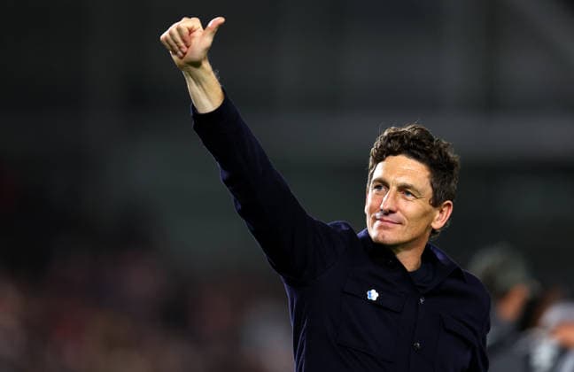 London, England, 18th September 2026. Keith Andrews head coach of Brentford gestures in celebration to the fans after the Brentford vs Chelsea Premier League match at Gtech Community Stadium, London. Picture credit should read: Paul Terry Sportimage EDITORIAL USE ONLY. No use with unauthorised audio, video, data, fixture lists, club league logos or live services. Online in-match use limited to 120 images, no video emulation. No use in betting, games or single club league player publications. SPI_042_PT_Brentford_Chelsea SPI-5005-0042