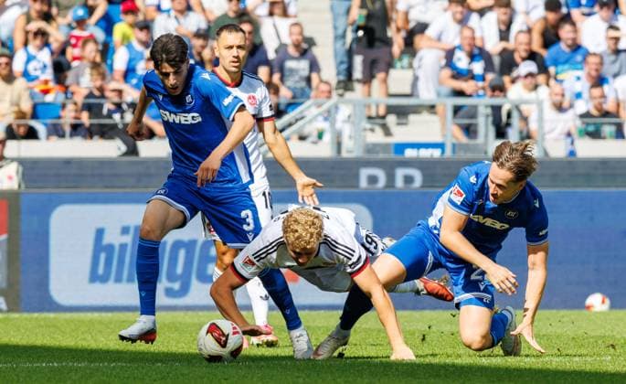 September 19, 2026 Soccer Season 2026–2027, Matchday 2, Bundesliga, Karlsruher SC (KSC) vs. 1. FC Nürnberg (FCN) Club Sports Photo by Zink DaMa xdaxmax DFL regulations prohibit any use of photographs as image sequences and or quasi-video For editorial use only. Deniz Ofli 3, Karlsruher SC (KSC); Piet Scobel 19, 1. FC Nürnberg (FCN); Christoph Kobald 22, Karlsruher SC (KSC)