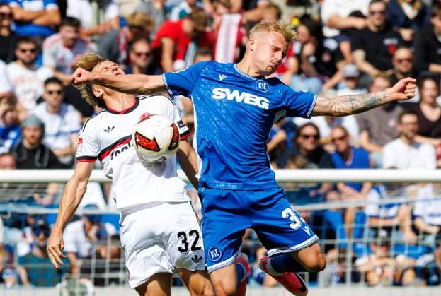 September 19, 2026 Soccer Season 2026–2027, Matchday 2, Bundesliga, Matchday 6: Karlsruher SC (KSC) vs. 1. FC Nürnberg (FCN) Club Sports Photo by Zink DaMa xdaxmax. DFL regulations prohibit any use of photographs as image sequences and or quasi-video For editorial use only. Tim Janisch 32, 1 FC Nürnberg (FCN) in a header duel with Viktor Bergh 33, Karlsruher SC (KSC)