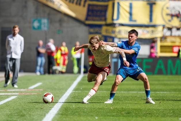 Samuele di Benedetto of Eintracht Braunschweig in a tackle with Paul Joly of 1 FC Kaiserslautern, Action: 1 FC Kaiserslautern vs. Eintracht Braunschweig, Soccer, 2. Bundesliga, Matchday 6, 2026–2027 Season, September 19, 2026: 1 FC Kaiserslautern vs. Eintracht Braunschweig, Soccer, 2. Bundesliga, Matchday 6, 2026–2027 Season, September 19, 2026 Copyright: xEibnerxPressefotox EP_ANS