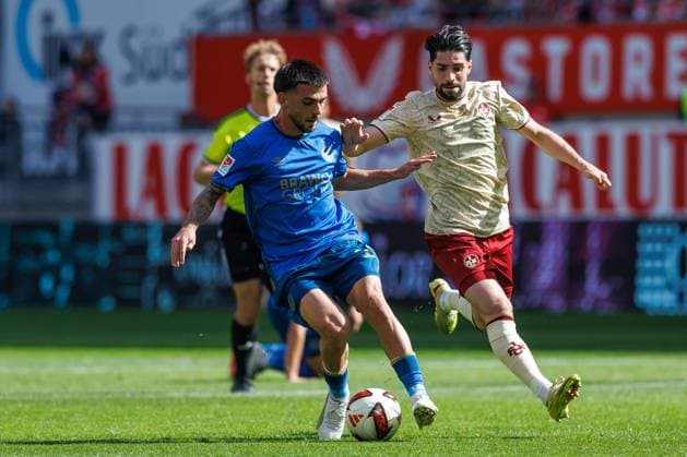 Samuele di Benedetto of Eintracht Braunschweig in a tackle with Semi Sahin of 1 FC Kaiserslautern, Action: 1 FC Kaiserslautern vs. Eintracht Braunschweig, Soccer, 2. Bundesliga, Matchday 6, 2026–2027 Season, September 19, 2026, 1 FC Kaiserslautern vs. Eintracht Braunschweig, soccer, 2. Bundesliga, Matchday 6, 2026–2027 season, September 19, 2026 Copyright: xEibnerxPressefotox EP_ANS