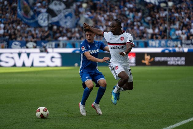 September 19, 2026, xjyhynx, Soccer 2. Bundesliga, Karlsruher SC vs. 1. FC Nürnberg, from left: Deniz Ofli 3, Karlsruher SC in a tackle with Mohamed Alì Zoma 23, 1. FC Nürnberg DFL DFB REGULATIONS PROHIBIT ANY USE OF PHOTOGRAPHS as IMAGE SEQUENCES and or QUASI-VIDEO Karlsruhe