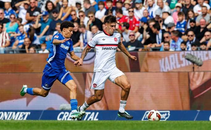 September 19, 2026 Soccer Season 2026–2027, Matchday 2, Bundesliga, Karlsruher SC (KSC) vs. 1. FC Nürnberg (FCN), Club Sports Photo by Zink DaMa xdaxmax. DFL regulations prohibit any use of photographs as image sequences and or quasi-video For editorial use only. Louey Ben Farhat 19, Karlsruher SC (KSC); Javier Fernandez 8, 1. FC Nürnberg (FCN)