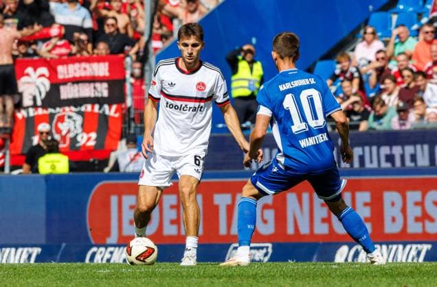 September 19, 2026 Soccer Season 2026–2027 Matchday 2 Bundesliga Karlsruher SC (KSC) vs. 1. FC Nürnberg (FCN) Club Sports Photo Zink DaMa xdaxmax DFL regulations prohibit any use of photographs as image sequences and or quasi-video For editorial use only Adam Markhiev 6, 1 FC Nuremberg (FCN) Marvin Wanitzek 10, Karlsruher SC (KSC)